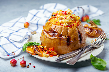 Image showing Pumpkin stuffed with couscous with vegetables. Healthy diet.