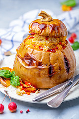 Image showing Pumpkin stuffed with couscous and fried vegetables.