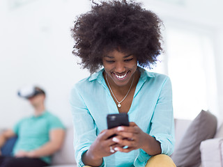 Image showing Multiethnic Couple using virtual reality headset