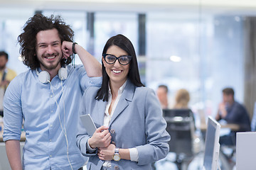 Image showing Business People Working With Tablet in startup office