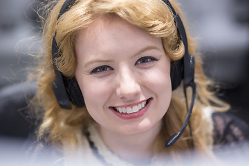 Image showing female call centre operator doing her job