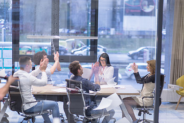 Image showing startup Group of young business people throwing documents