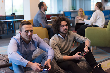 Image showing startup Office Workers Playing computer games