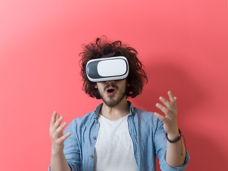 Image showing young man using VR headset glasses of virtual reality