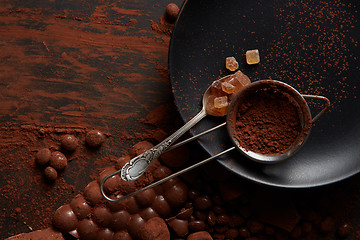 Image showing candies and cocoa powder