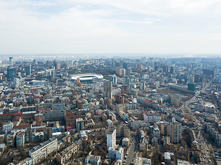 Image showing The city of Kiev, modern houses and roads with lots of cars. The area of Kiev with the Olympic Sports Complex