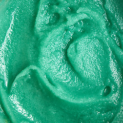 Image showing Macro photo of green fruit ice cream as a layout for your ideas. Summer dessert. Top view