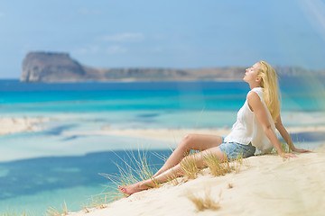 Image showing Relaxed Happy Woman Enjoying Sun on Vacations.