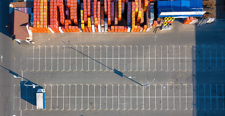 Image showing Ukraine, Kyiv. April 08, 2018: Aerial view, from the drone to the warehouse with a lot of different building materials and parking with a truck sunny day. Top view.