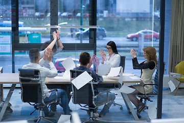 Image showing startup Group of young business people throwing documents