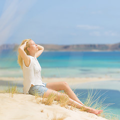 Image showing Relaxed Happy Woman Enjoying Sun on Vacations.