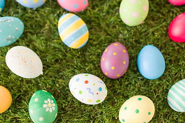 Image showing colored easter eggs on artificial grass