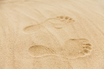 Image showing footprints in sand on summer beach