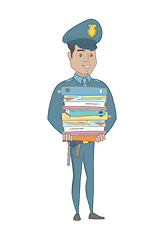 Image showing Young hispanic policeman holding pile of folders.