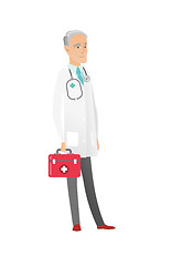 Image showing Senior caucasian doctor holding first aid box.