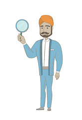 Image showing Hindu businessman with magnifying glass.