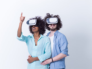 Image showing multiethnic couple getting experience using VR headset glasses