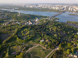 Image showing A bird\'s eye view, panoramic view from the drone to the Botanical Garden, the Motherland Monument , Dnieper River, Paton Bridge in the city of Kiev, Ukraine