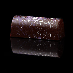 Image showing chocolate candy on black background