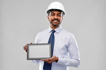 Image showing architect or businessman in helmet with tablet pc