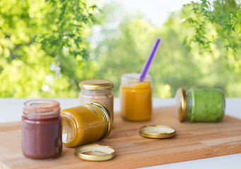 Image showing vegetable or fruit puree or baby food in jars