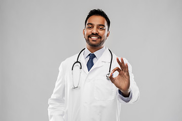 Image showing smiling indian male doctor showing ok gesture