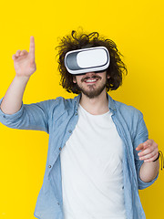 Image showing handsome man using VR headset glasses of virtual reality