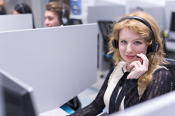 Image showing female call centre operator doing her job