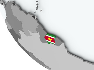 Image showing Flag of Suriname on political globe