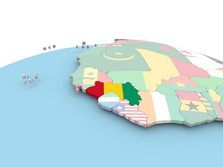 Image showing Flag of Guinea on bright globe