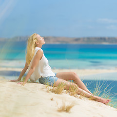 Image showing Relaxed Happy Woman Enjoying Sun on Vacations.