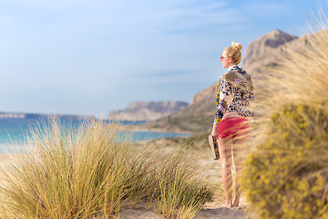 Image showing Free Happy Woman Enjoying Sun on Vacations.