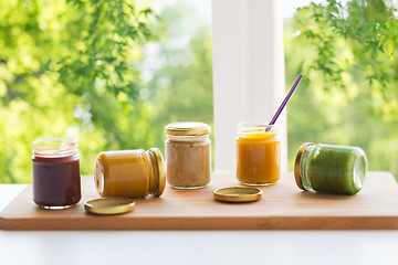 Image showing vegetable or fruit puree or baby food in jars