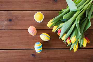 Image showing colored easter eggs and tulip flowers