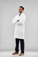 Image showing smiling male doctor or scientist in white coat