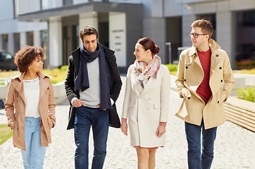 Image showing office workers or friends talking on city street