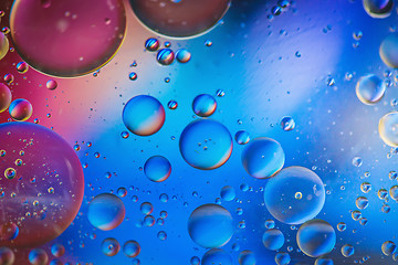 Image showing Multicolored abstract defocused background picture made with oil, water and soap