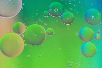 Image showing Defocused green defocused abstract background picture made with oil, water and soap