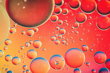 Image showing Red and orange abstract background picture made with oil, water and soap