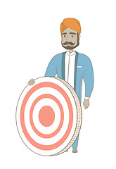 Image showing Young hindu businessman and dart board.