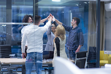 Image showing startup Group of young business people celebrating success
