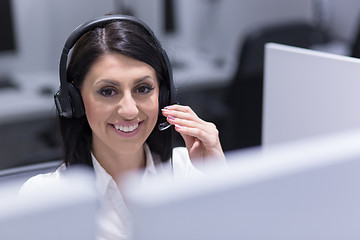 Image showing female call centre operator doing her job