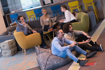 Image showing startup Office Workers Playing computer games