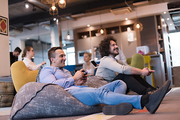 Image showing startup Office Workers Playing computer games