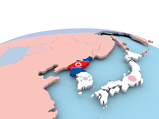 Image showing Flag of North Korea on bright globe