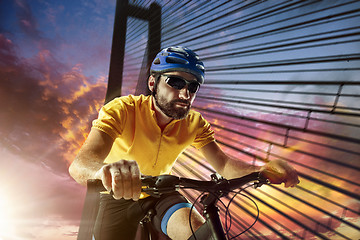 Image showing Cyclist portrait on urban night scene