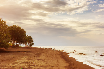 Image showing a dark sand beach in northern Bali Indonesia