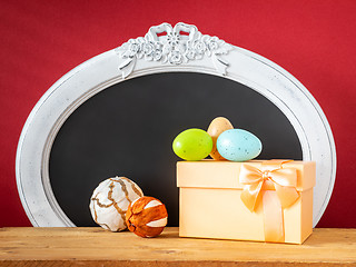 Image showing Easter decoration gift box eggs and vintage frame