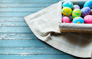 Image showing close up of colored easter eggs in basket