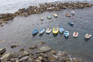 Image showing Many of small fishermen boats in the dock